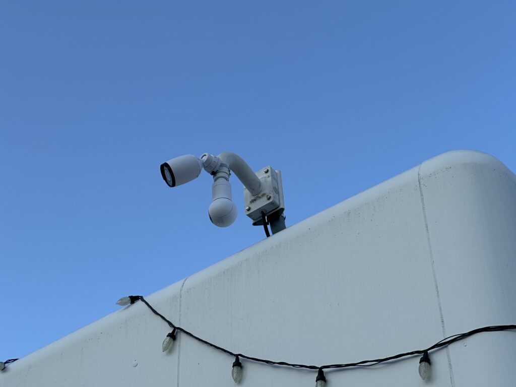 Professional installation and configuration of smart camera systems for digital strike's campus.