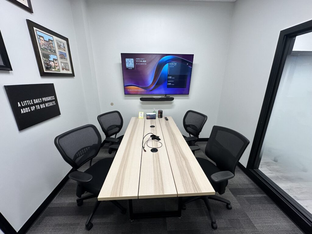 Professional conference room setup for Core Properties by Arch Technologies.
